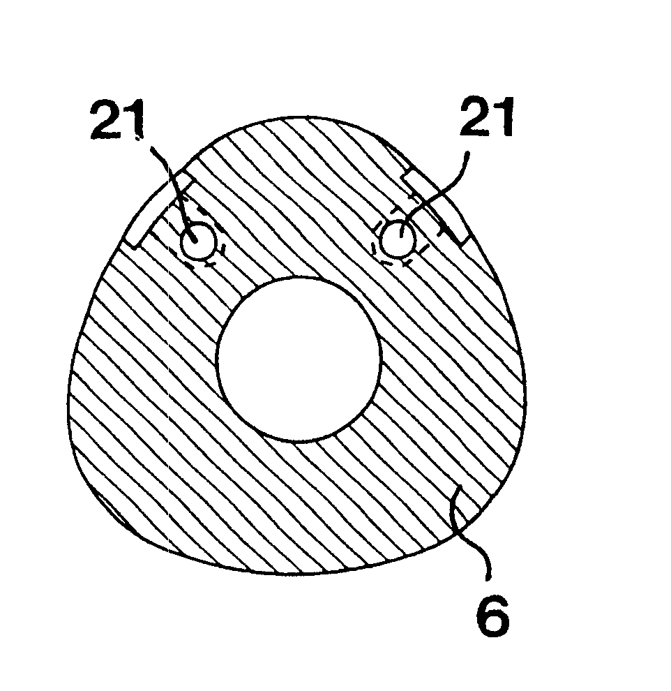 Cutting tool having liquid-spraying nozzles for controlling chip formation