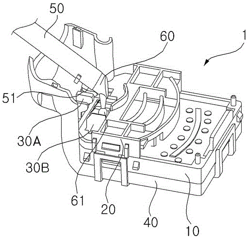 The multi-function switch assembly at the bottom left side of the steering wheel