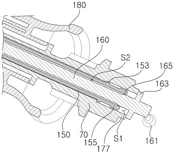 The multi-function switch assembly at the bottom left side of the steering wheel