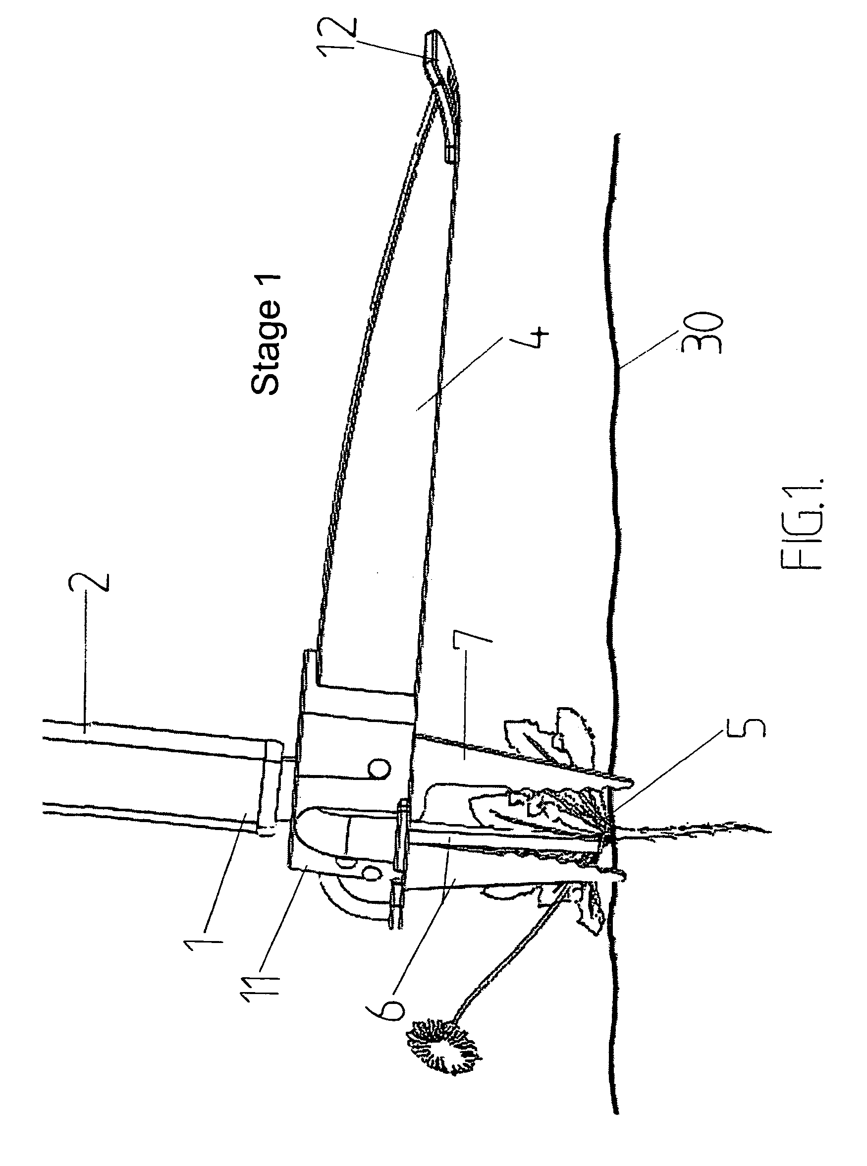 Device for removing plants or the like from ground