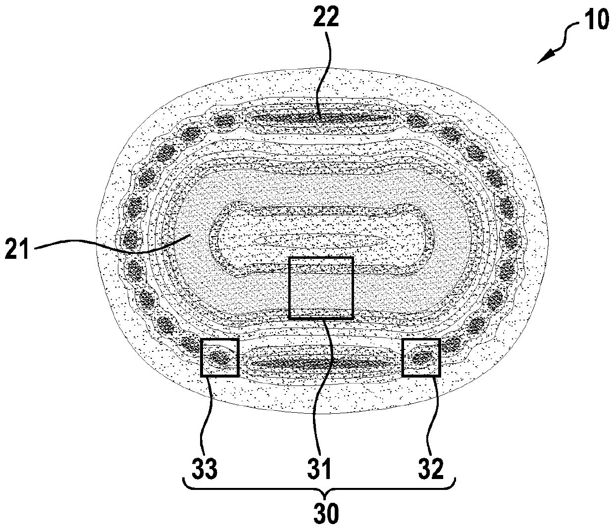 Device for inductively charging an electric vehicle, and method for detecting electrically conductive foreign bodies in such a device