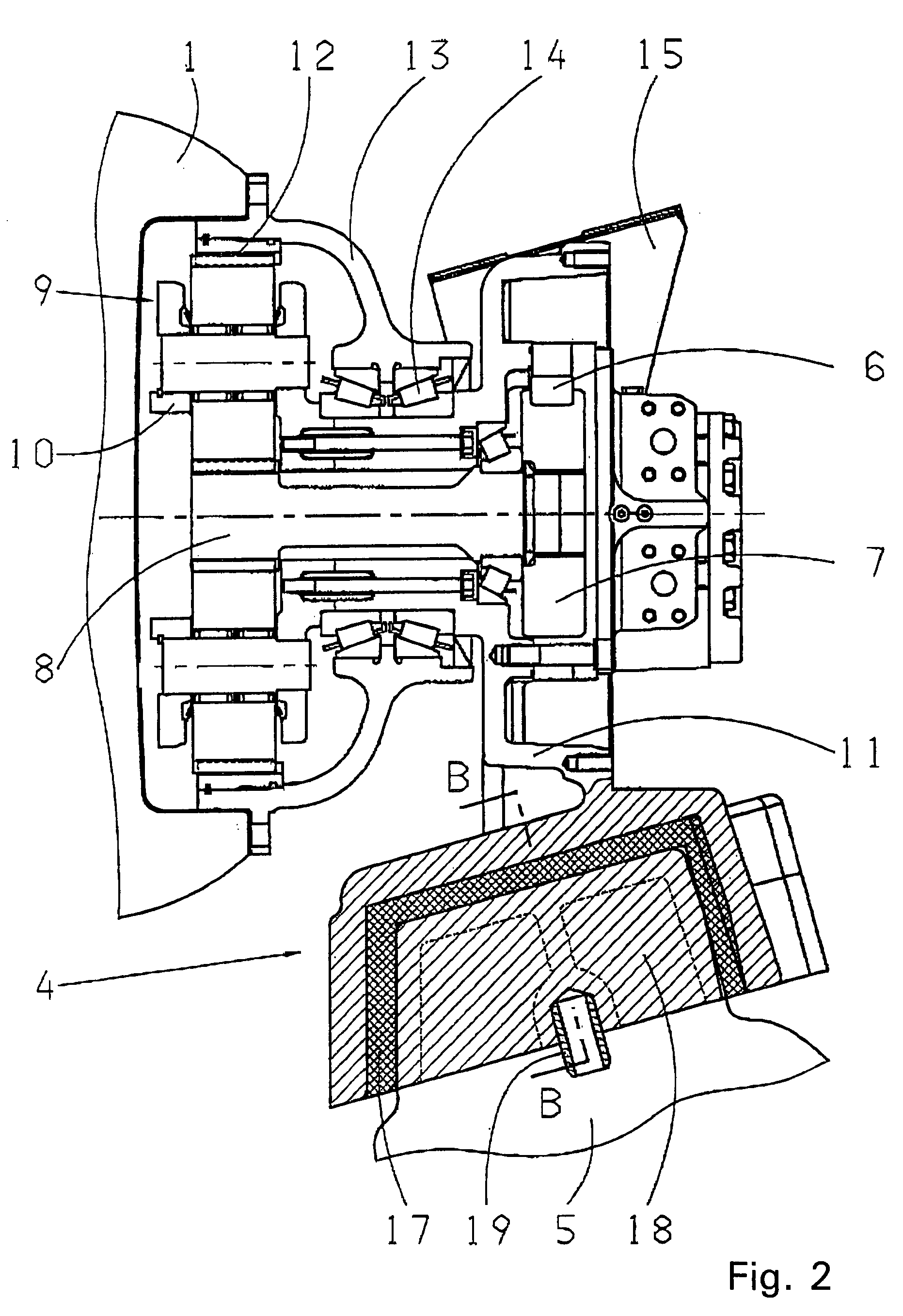 Drive for mixing drum with elastic element arranged between bearing incorporating drive system and base