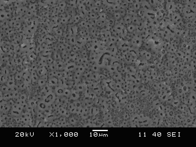 Preparation method of titanium alloy/biological ceramic layer composite material