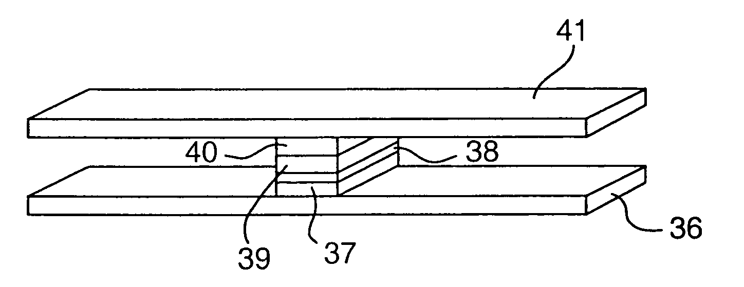 Magnetic apparatus with perpendicular recording medium and head having multilayered reproducing element using tunneling effect