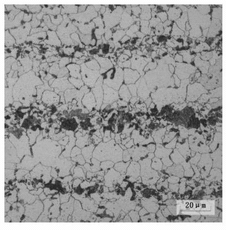 Production method of wide and heavy steel plate with excellent ultra-low-temperature toughness used for offshore wind power