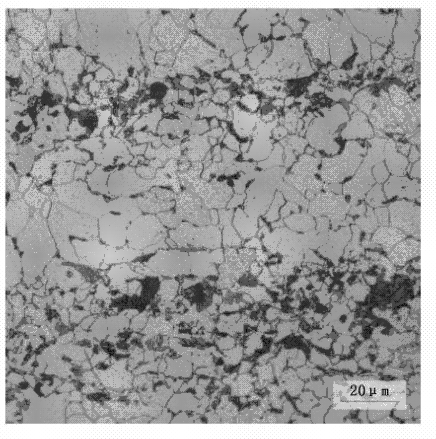 Production method of wide and heavy steel plate with excellent ultra-low-temperature toughness used for offshore wind power