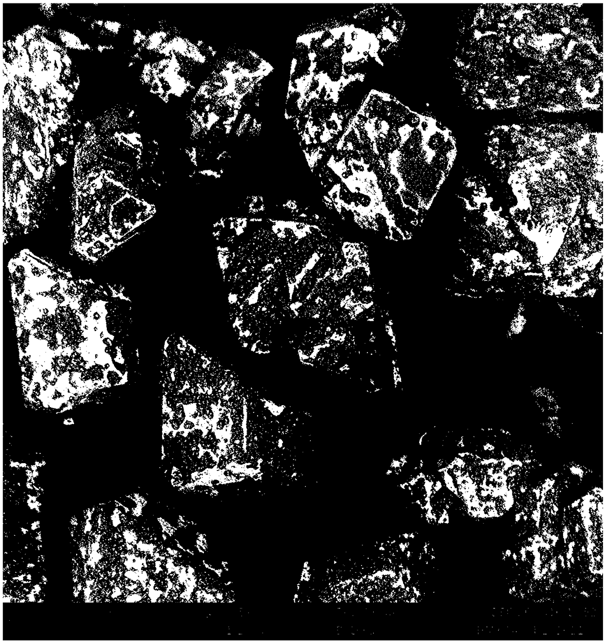 Method for reducing sensitivity by elastomer and graphene double coating of HMX