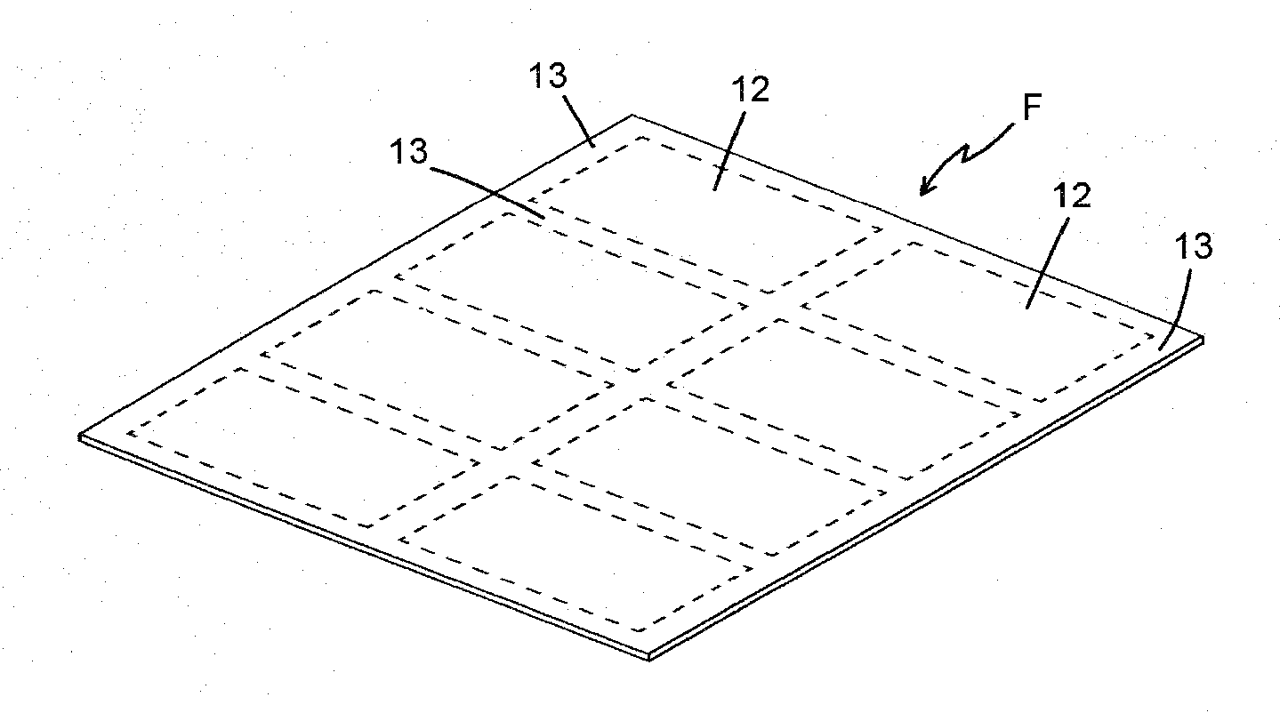 Glass substrate having a patterned layer of compressive stress on a surface thereof