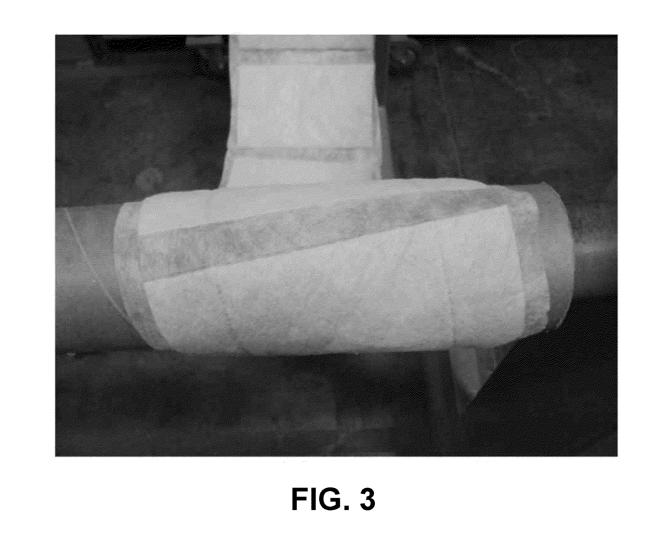 Method of Packaging a Continuous Length of Product on a Spool using Indexed Layers