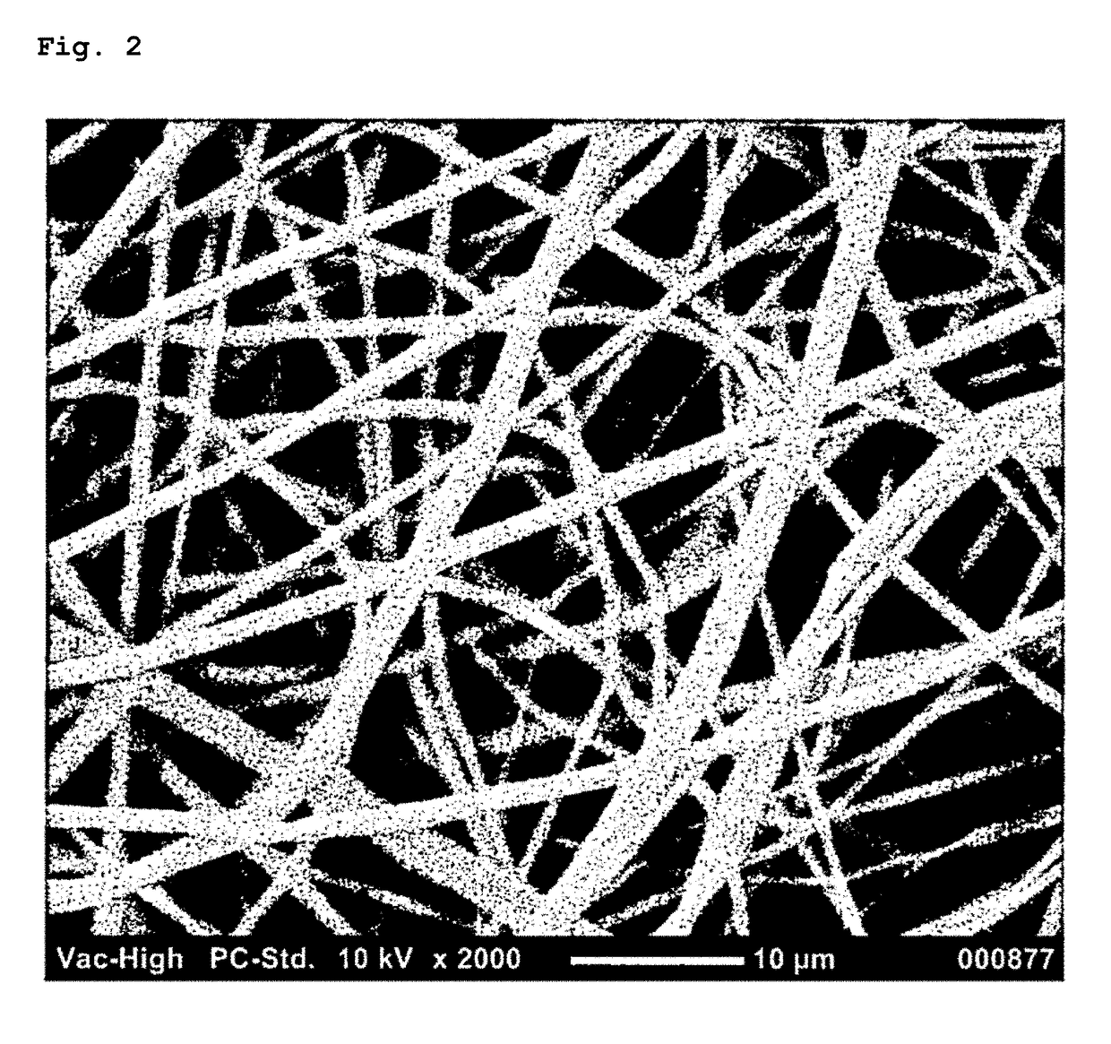 Sustained drug release sheet for treating nerve injury