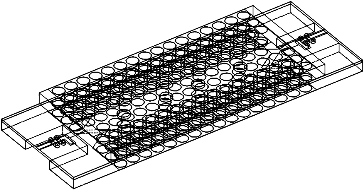 Band-pass filter based on substrate-integrated non-radiative dielectric waveguide