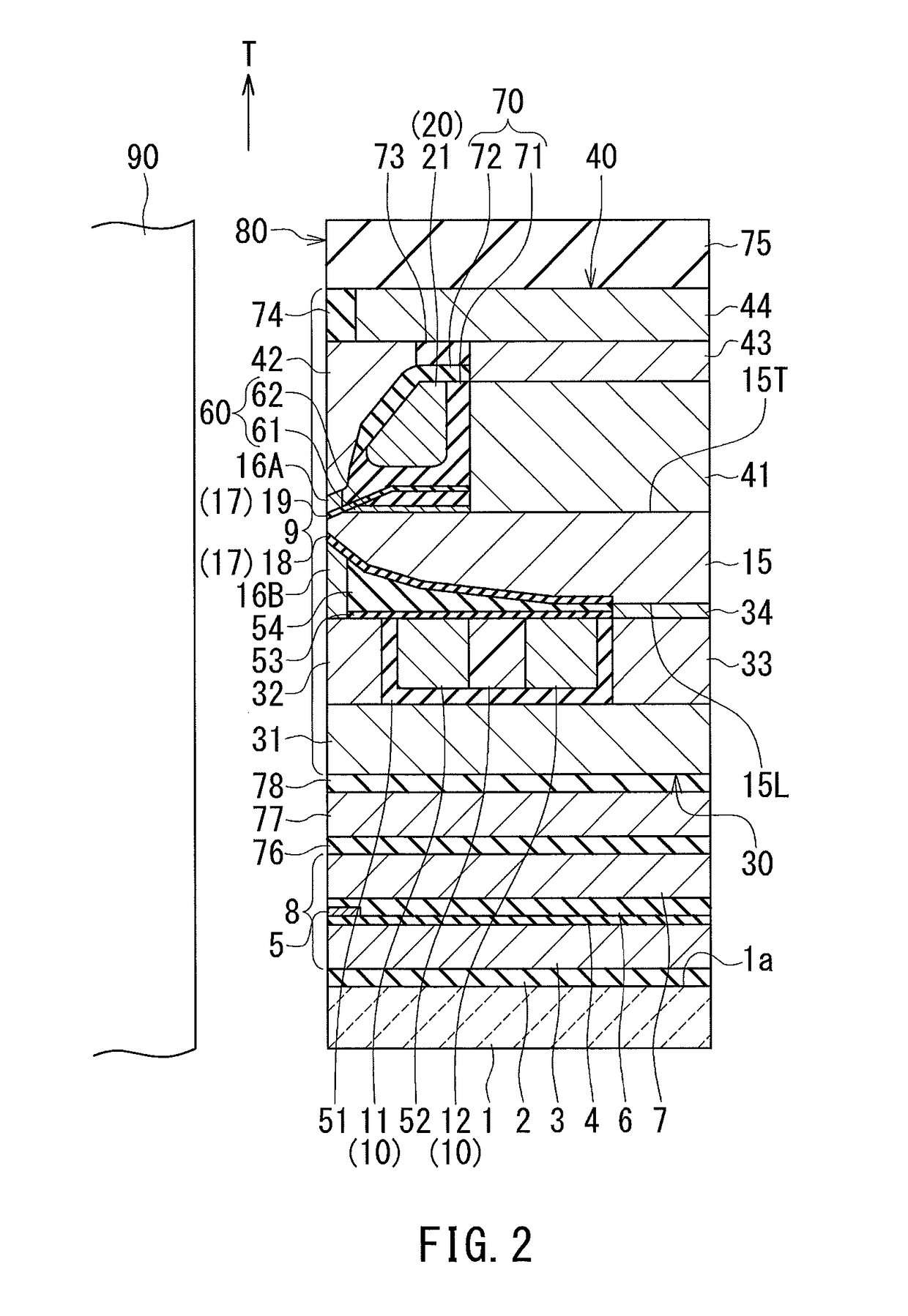 Magnetic head for perpendicular magnetic recording including a coil having an inclined surface