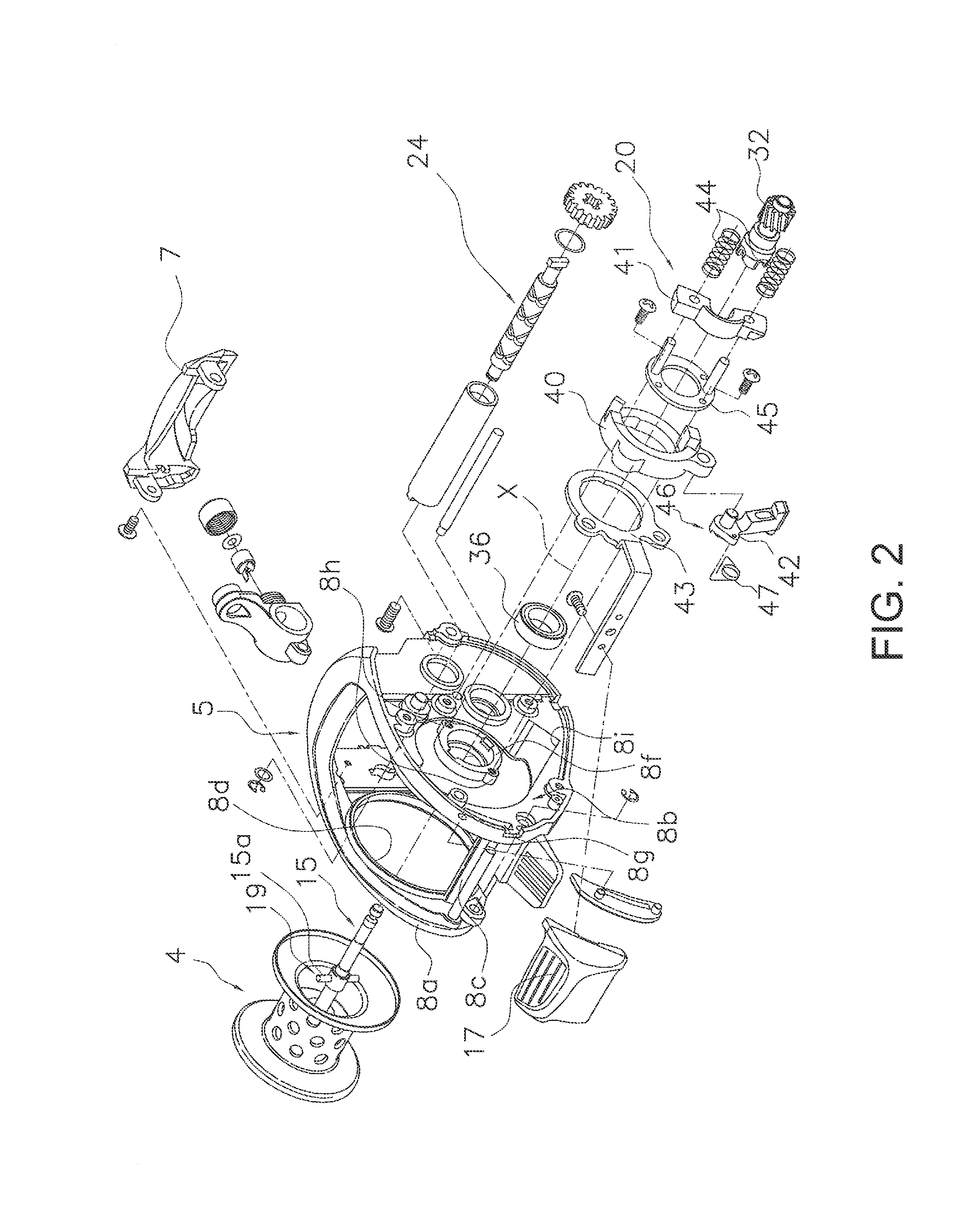 Clutch return mechanism for a dual-bearing reel