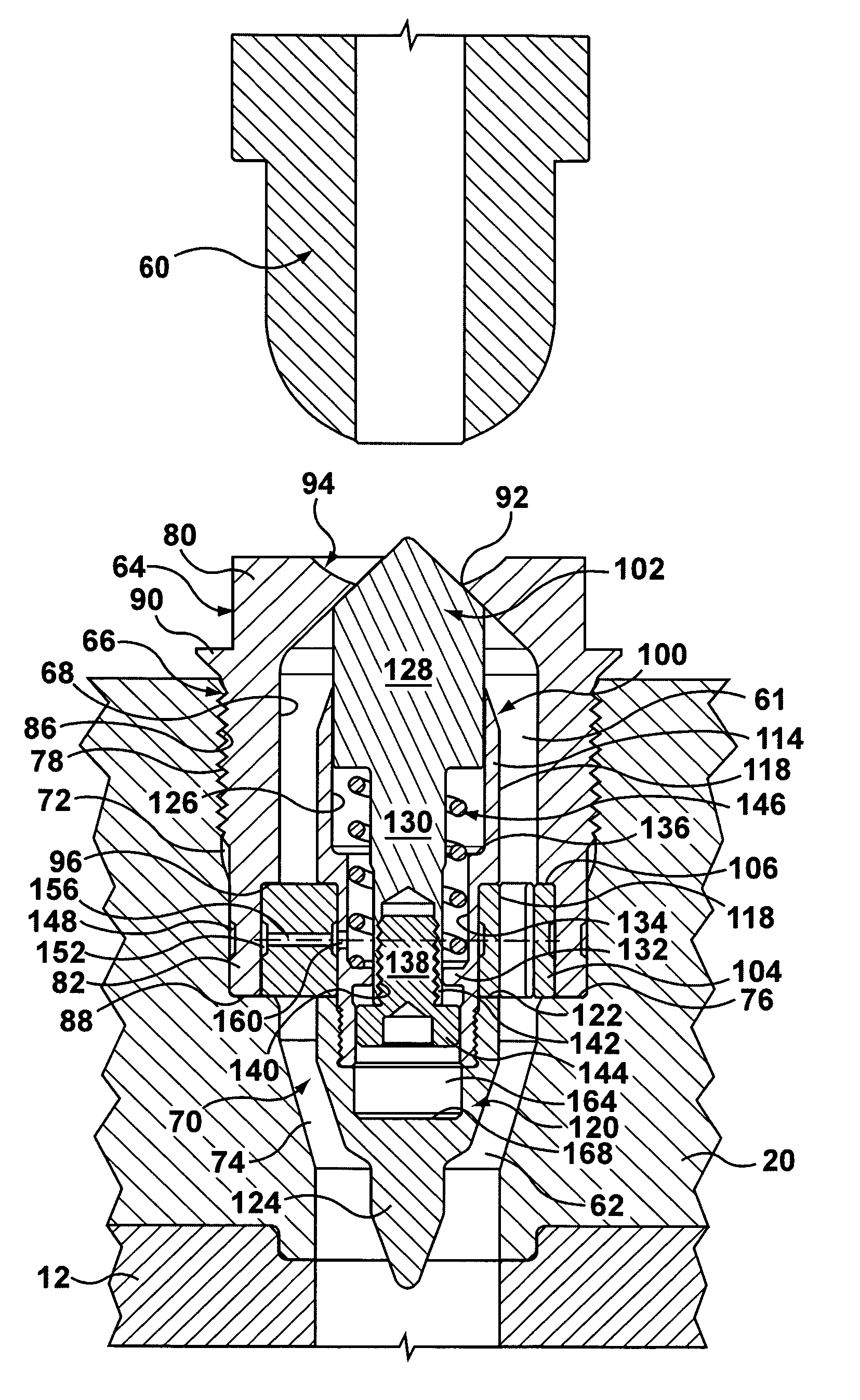 Anti-drool mechanism for a sprue bushing