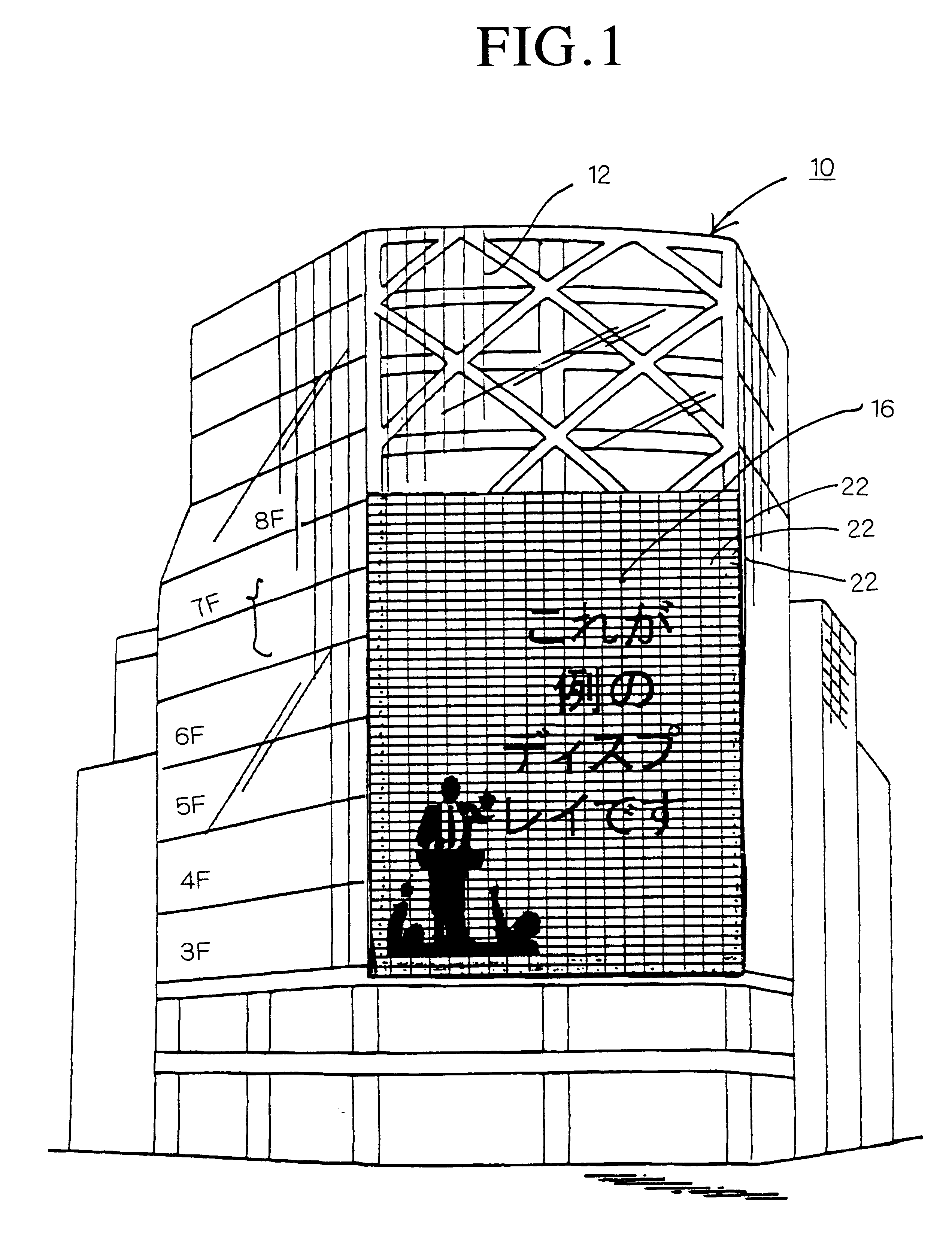 High-rise building with large scale display device inside transparent glass exterior