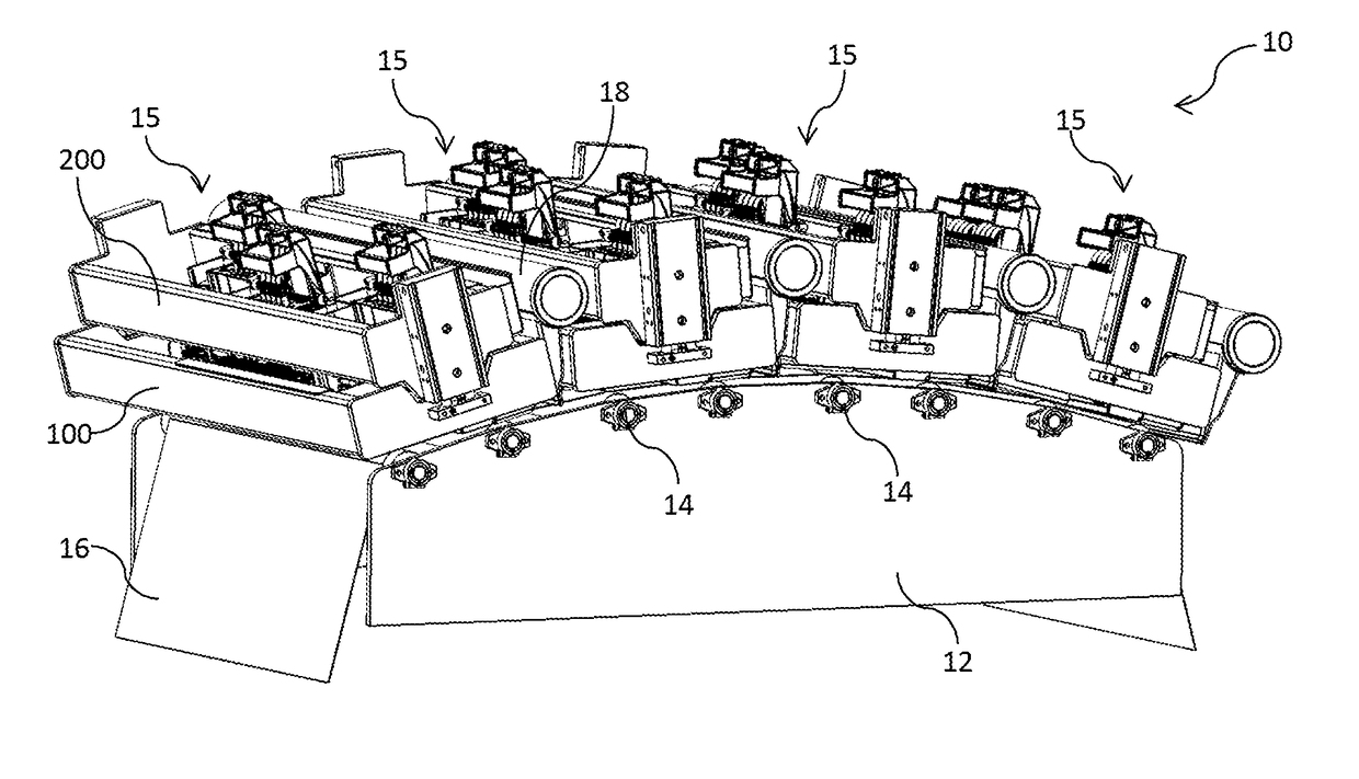 Printer having l-shaped maintenance modules for plurality of printheads