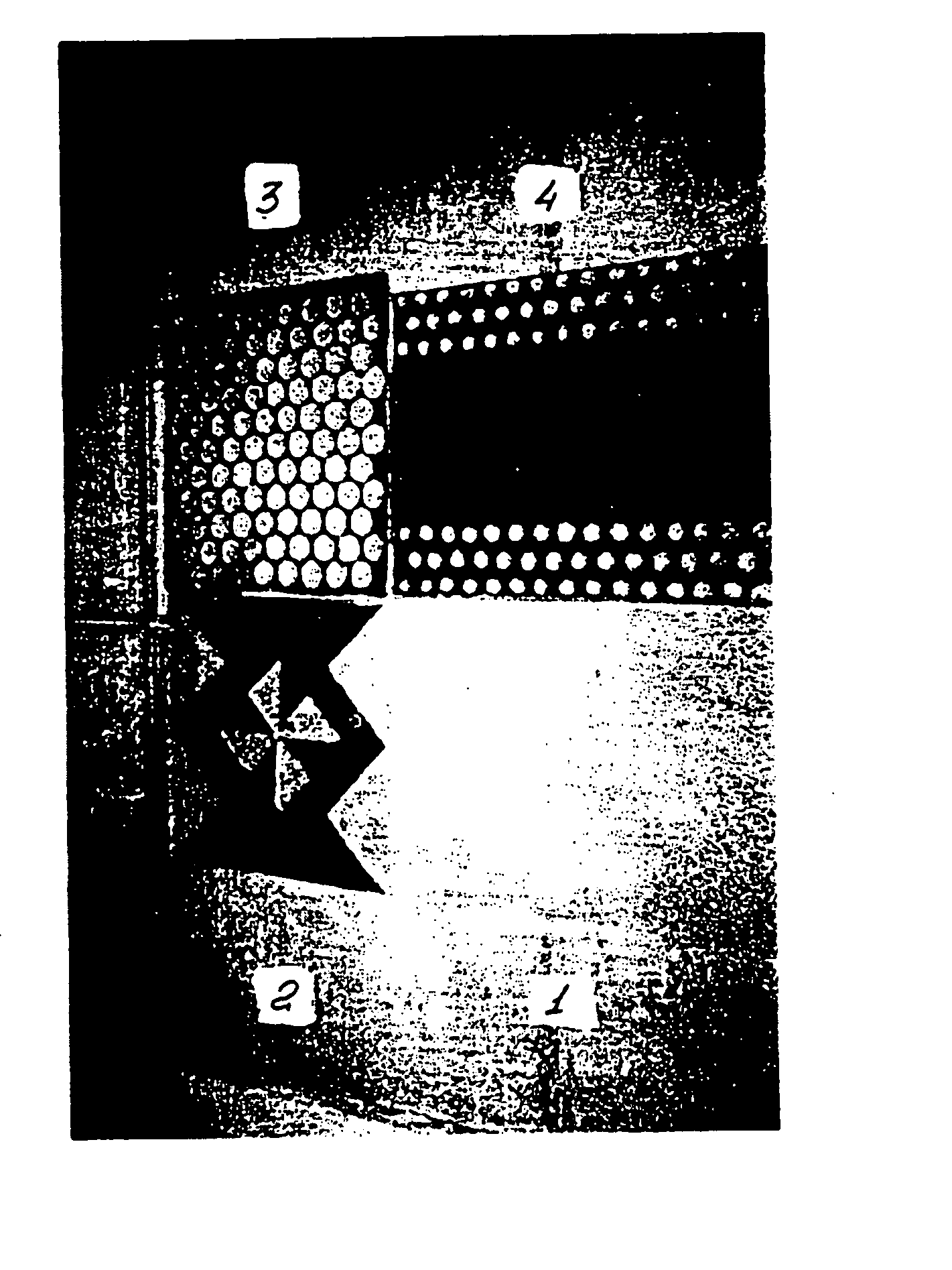 Method for continous production of decorative facing slabs and a device for carrying out said method, decorative facing material