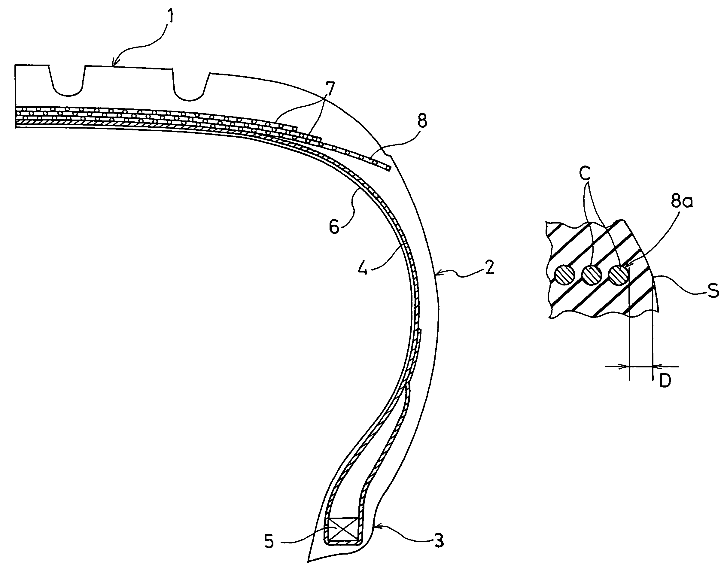 Pneumatic tire with wound cord layer between carcass layer and belt layers