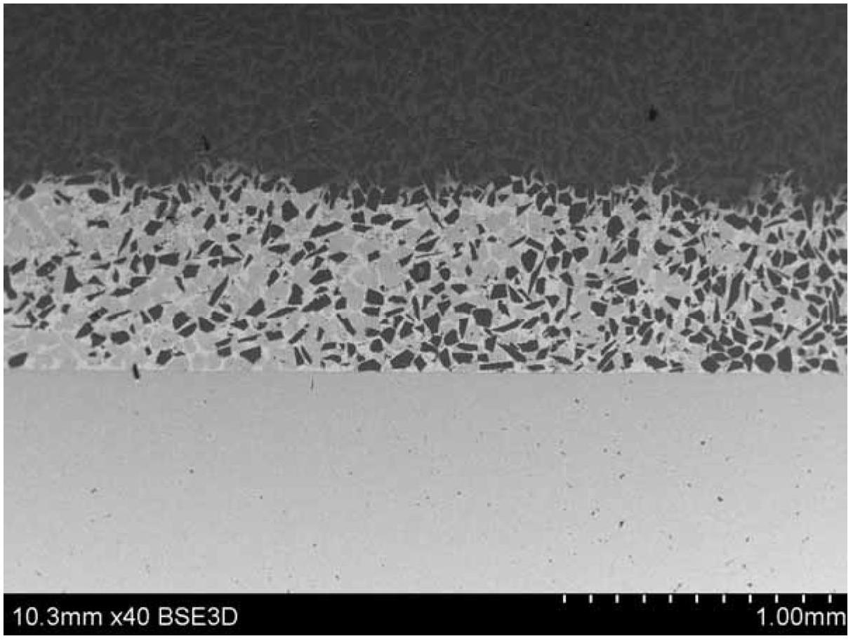 Ultrasonic brazing method for high-volume-fraction silicon carbide particle enhanced aluminum-base composite and low-expansion alloy