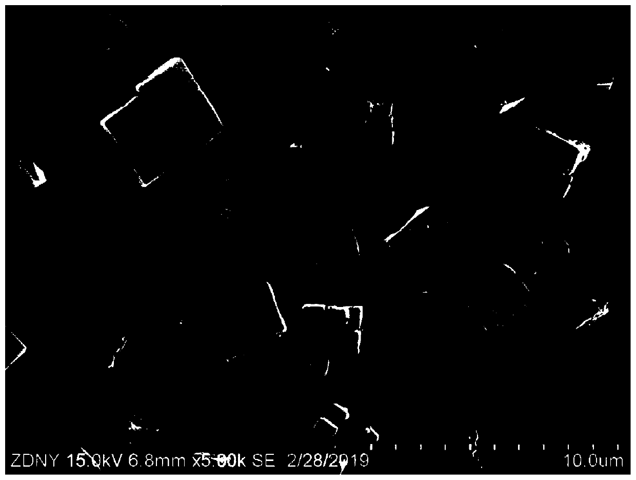 Metal-modified hollow SAPO-34 molecular sieve and production method and application thereof