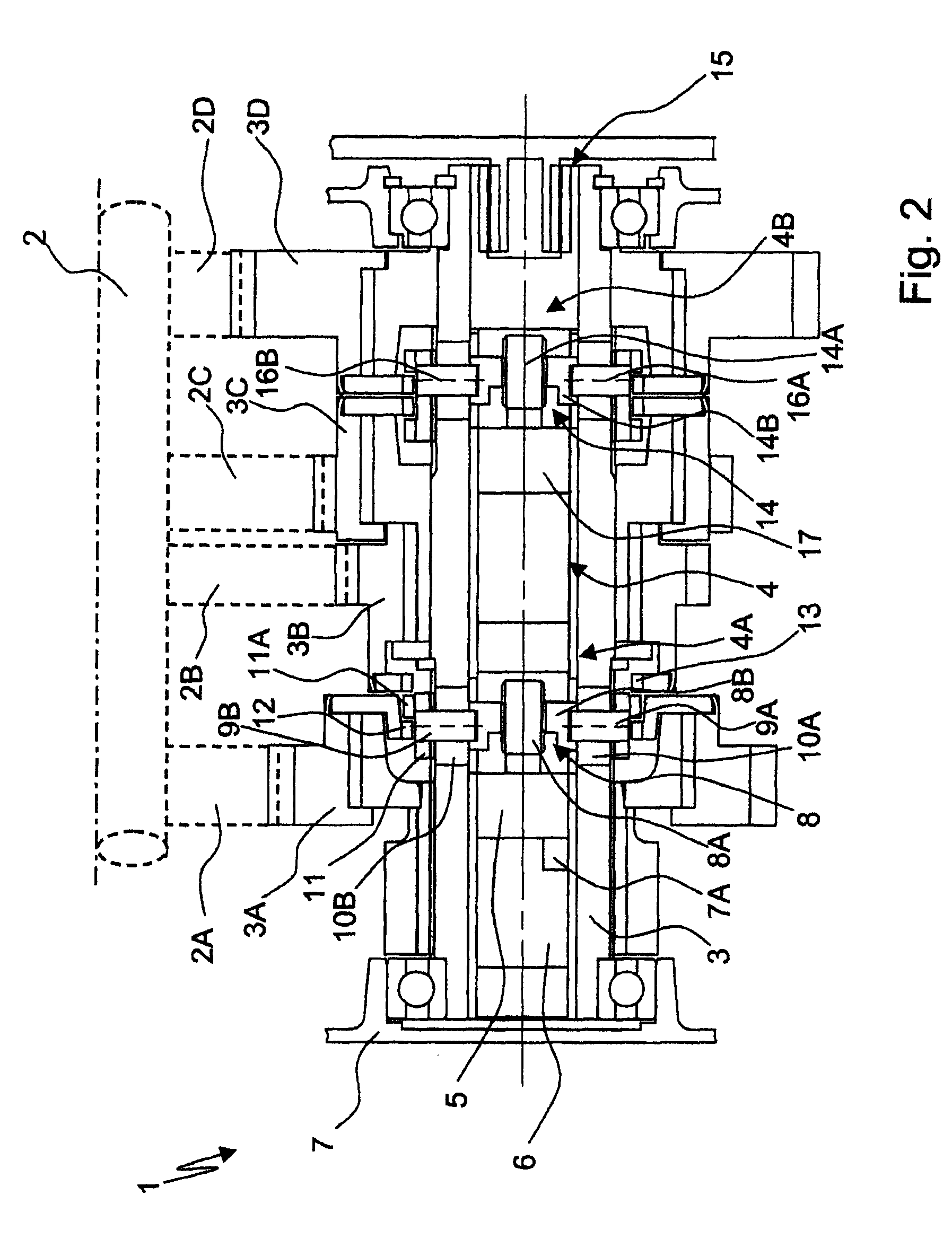 Device for actuating a gearwheel, which is designed as a loose wheel, of a transmission device