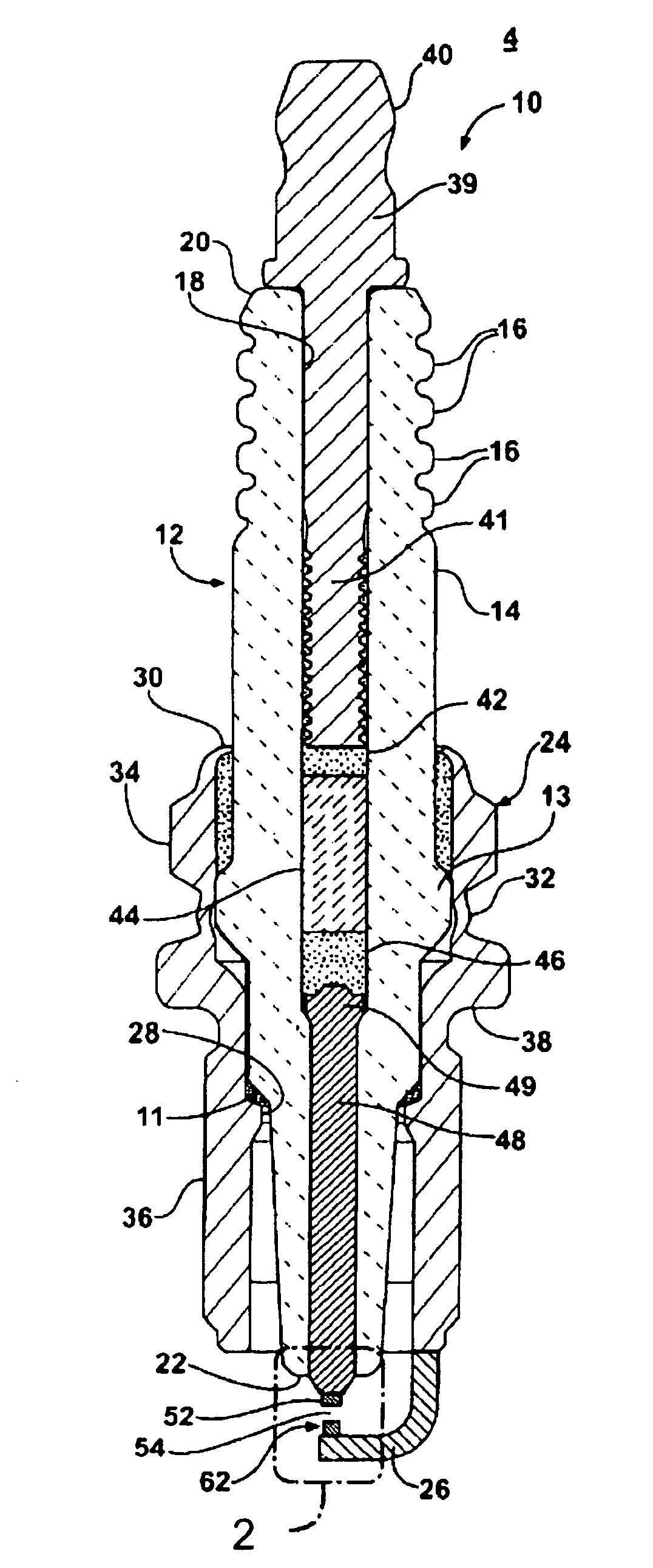 Alloys for spark ignition device electrode spark surfaces