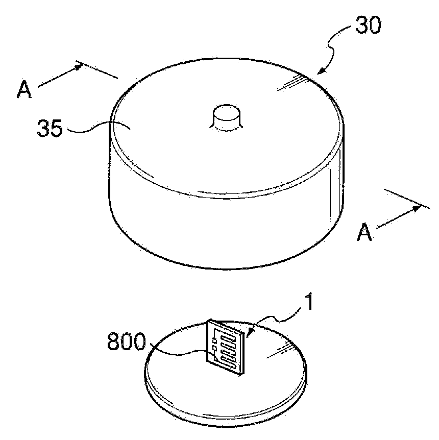 Load measuring transducer using induced voltage for reducing measuring errors and load measuring system using the same