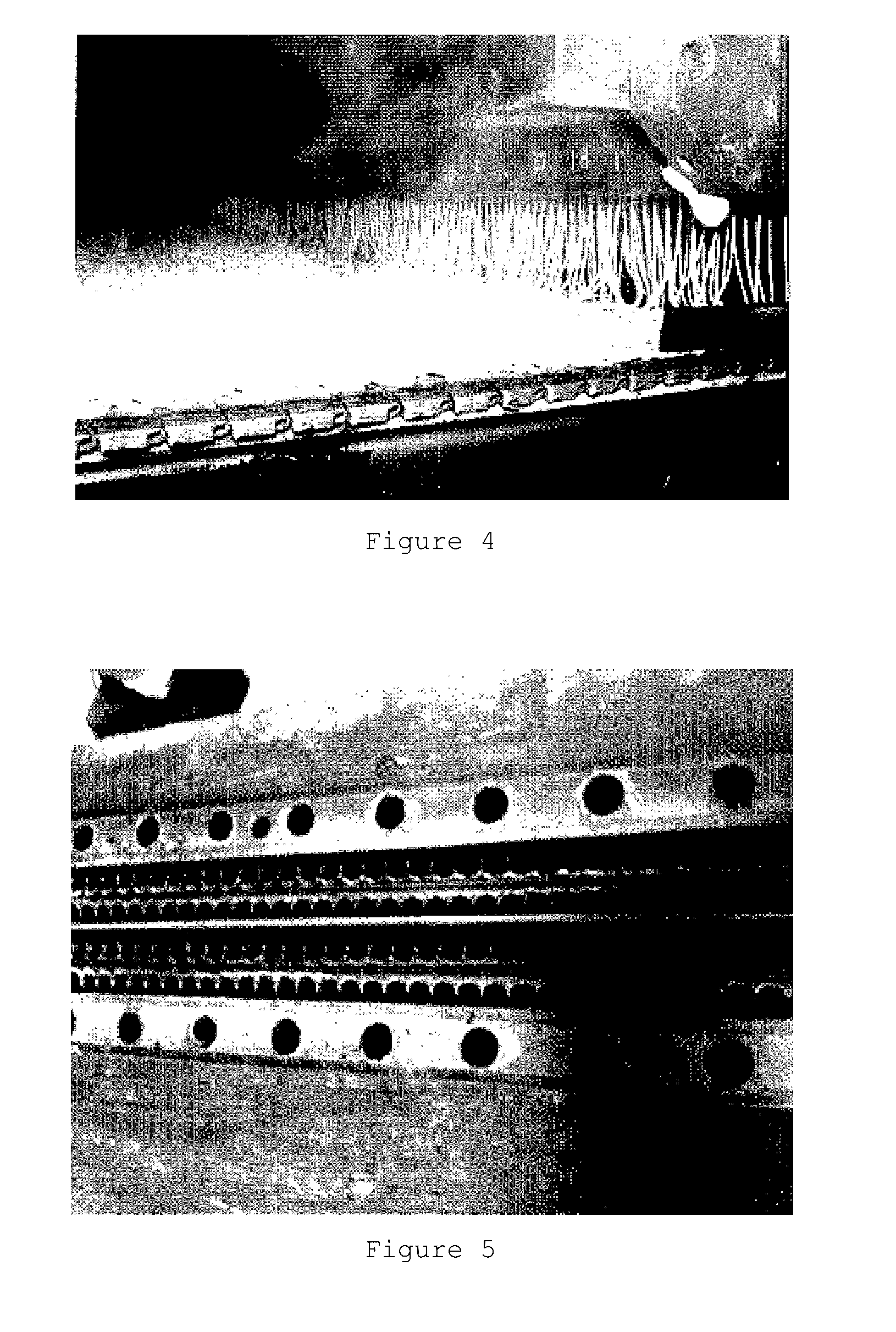 Application of a random-laid web for roadway construction with improved adhesion properties