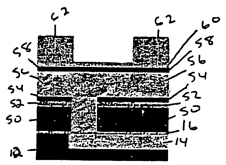 Use of a porous dielectric material as an etch stop layer for non-porous dielectric films