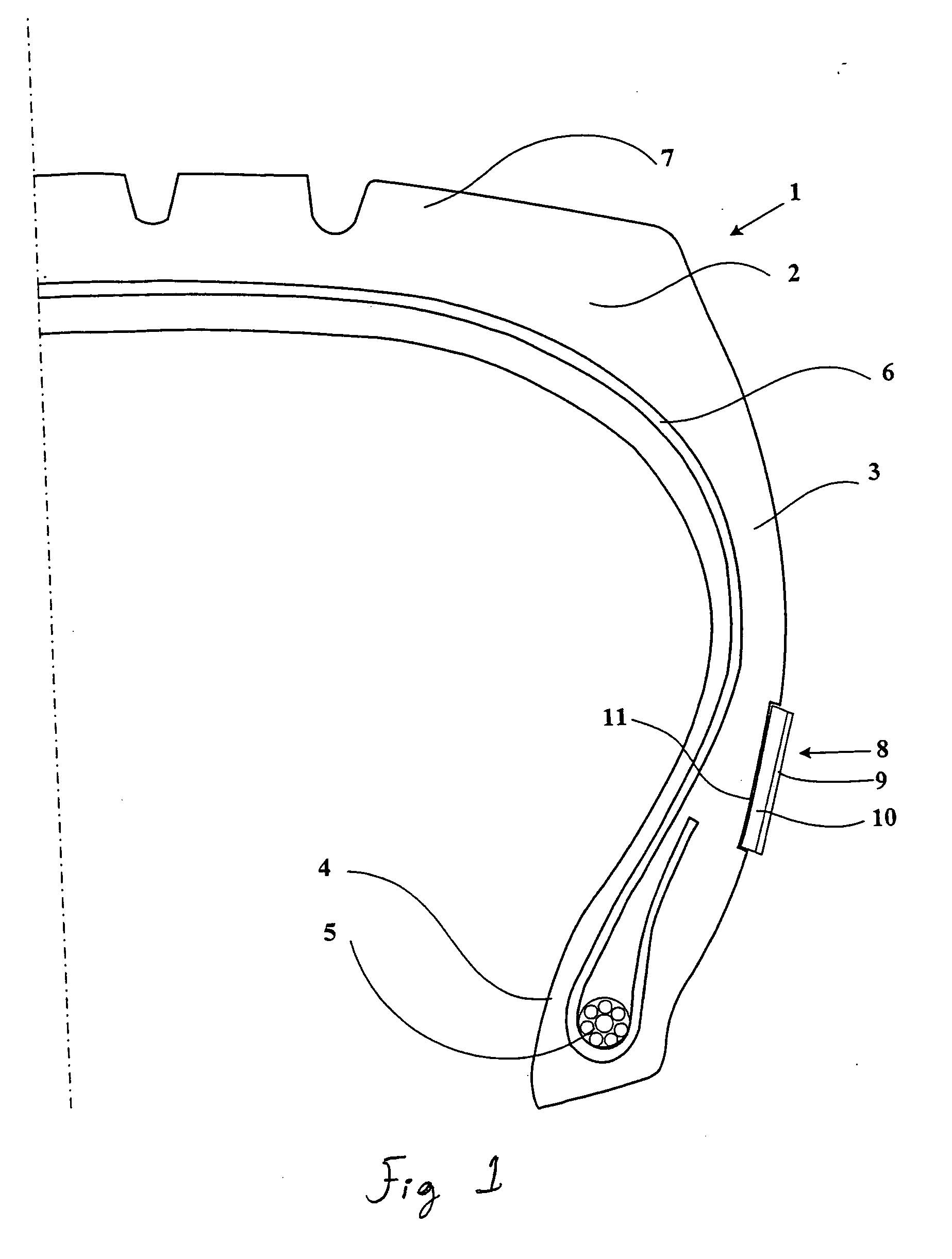 Tire having an element or covering attached to a surface thereof