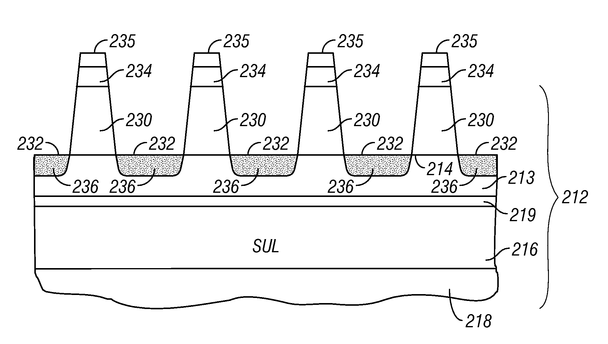 Patterned perpendicular magnetic recording medium with exchange coupled recording layer structure and magnetic recording system using the medium