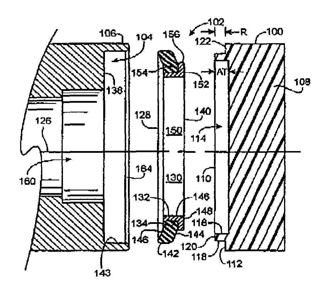 Assembly including face seal sized to interference fit in housing