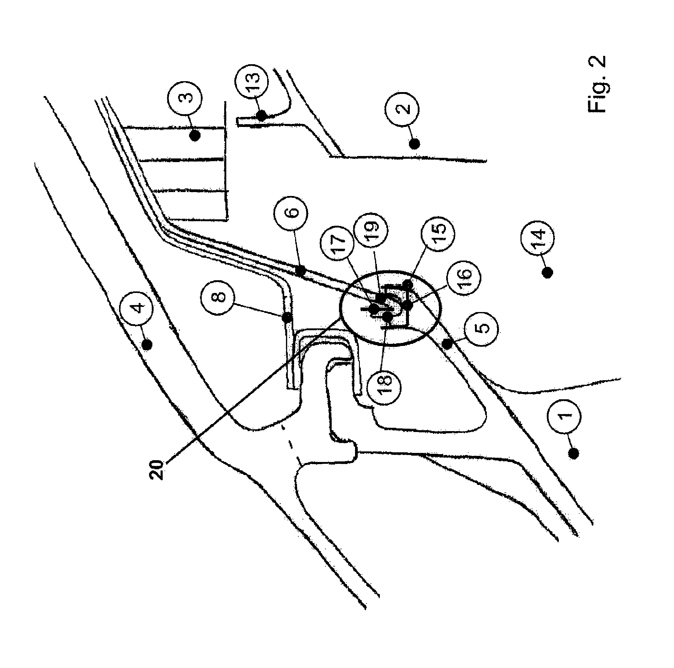 Seal carrier attachment for a turbomachine