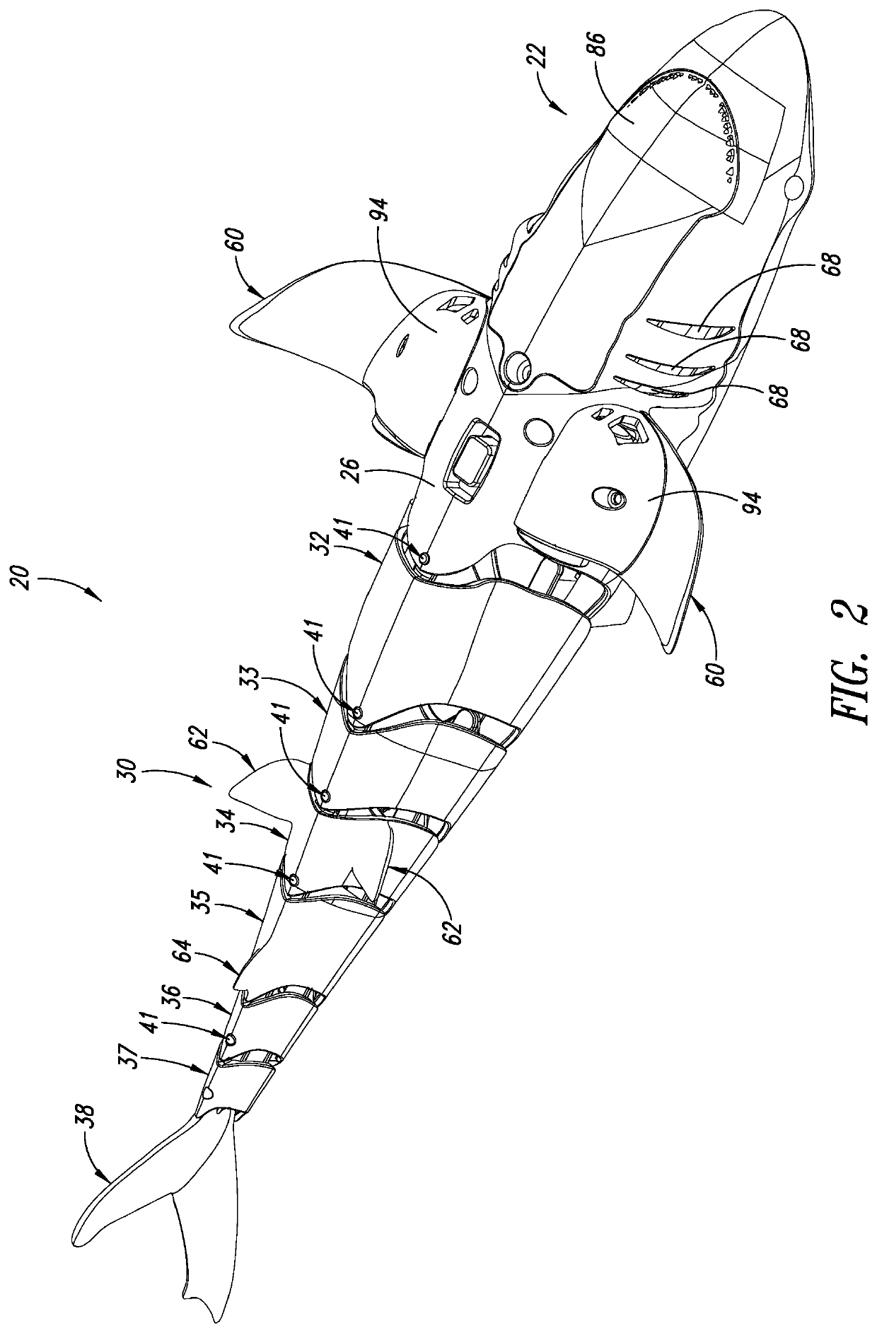 Motorized aquatic toy with articulated tail