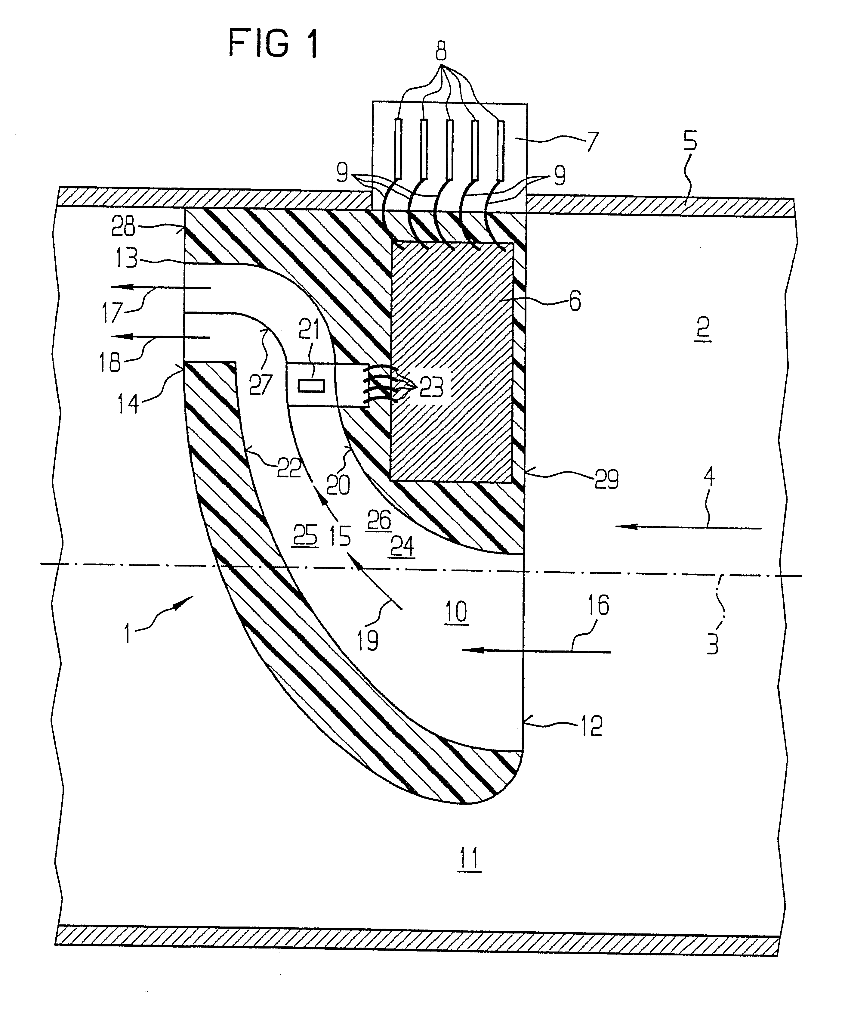 Measuring device for measuring the mass of a medium flowing in a line