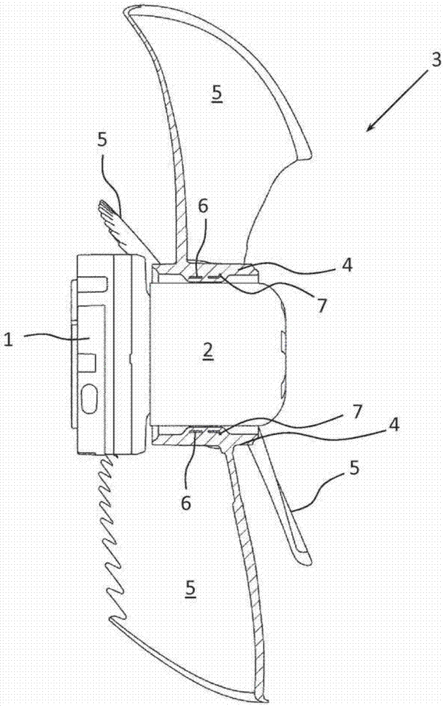 Arrangement of an impeller on a rotating part and method for producing the arrangement