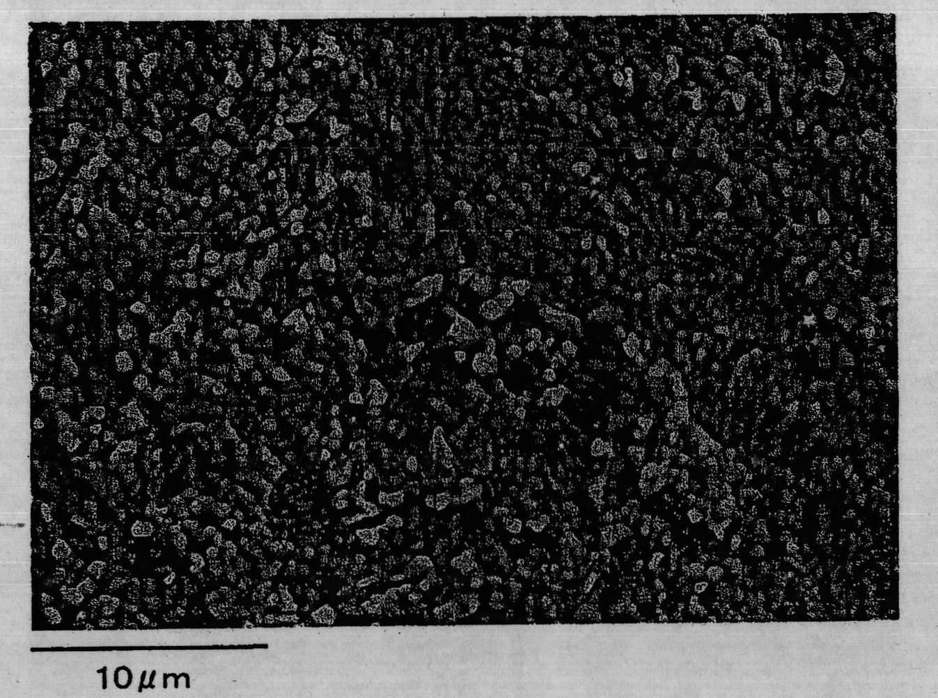 Surface-treated steel sheet on which particulate tin is deposited and resin-coated steel sheet