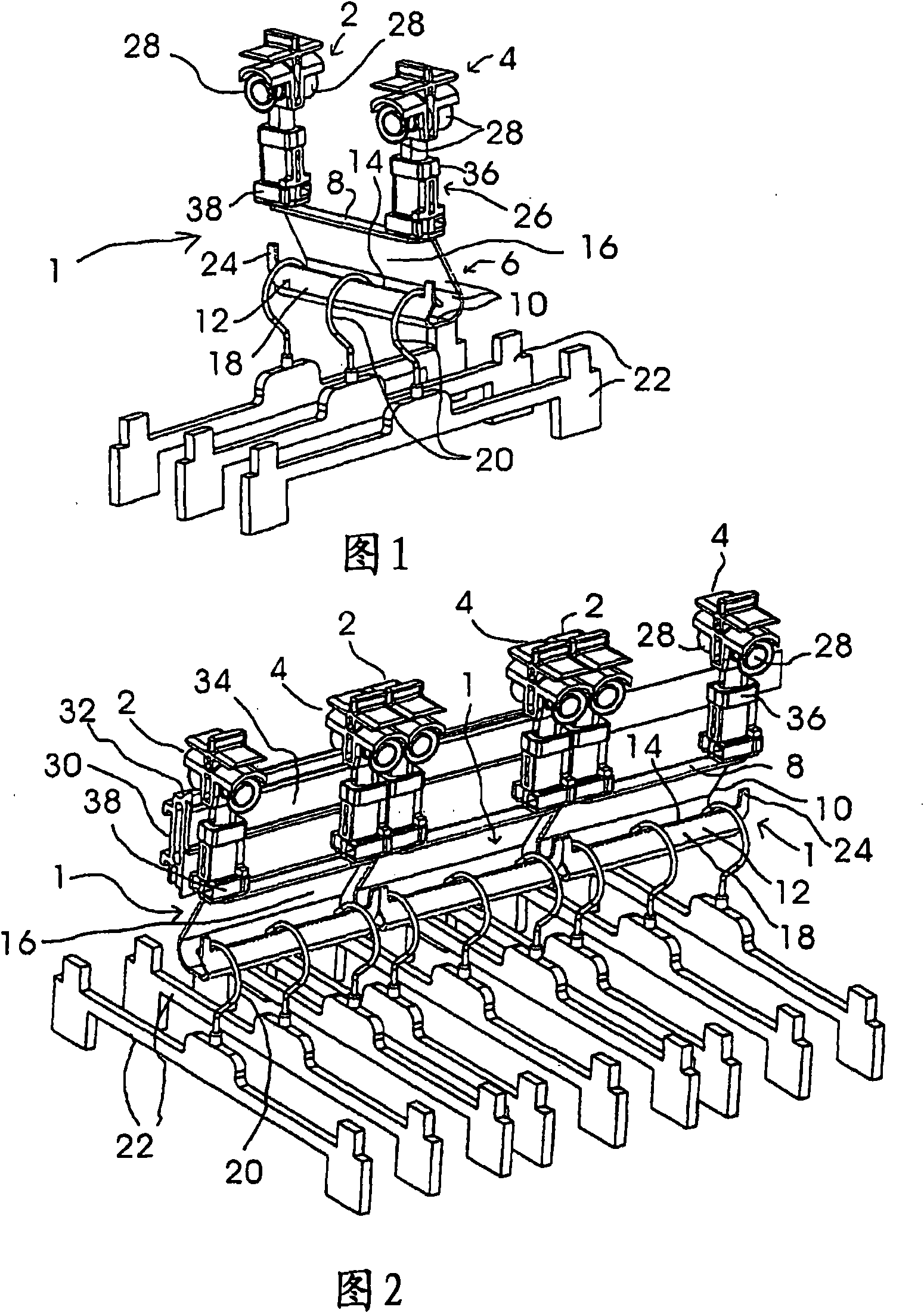 Conveying means for an overhead conveyer