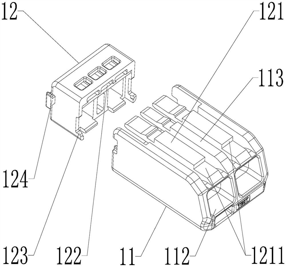 Insulating material shell and electric connector