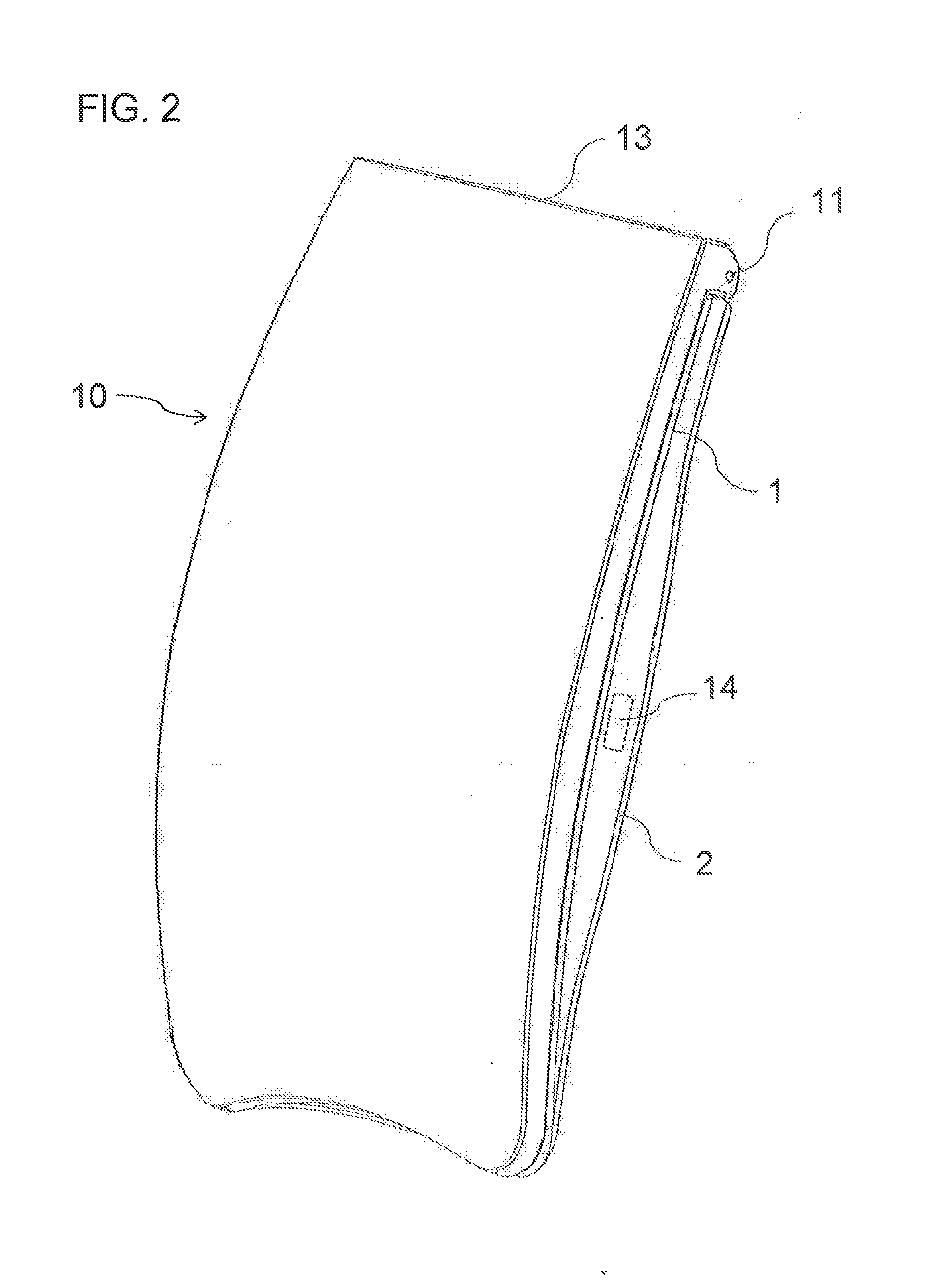 Foldable curved wireless communication device for insertion into hip pocket