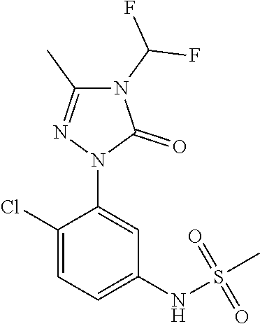 Purification of N-(2,4-dichloro-5-(4-(difluoromethyl)-3-methyl-5-oxo-4,5-dihydro-1H-1,2,4-triazol-1-yl) methanesulfonamide herbicide using selective pH adjusted extractions