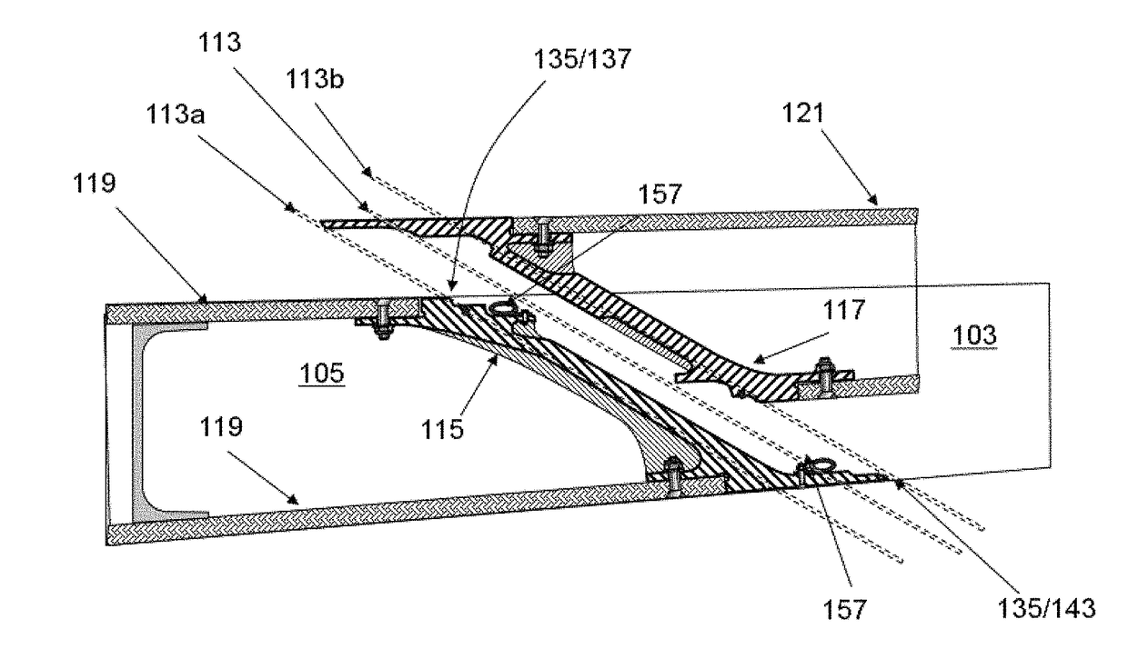 Arrangement of ribs at an interface between an outer end of a wing and a moveable wing tip device