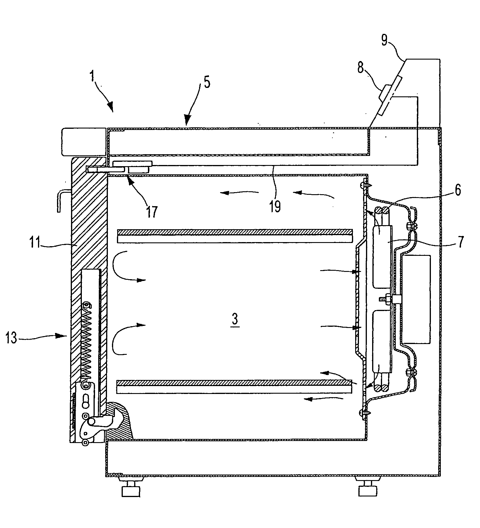 Heating cooker with hinged door