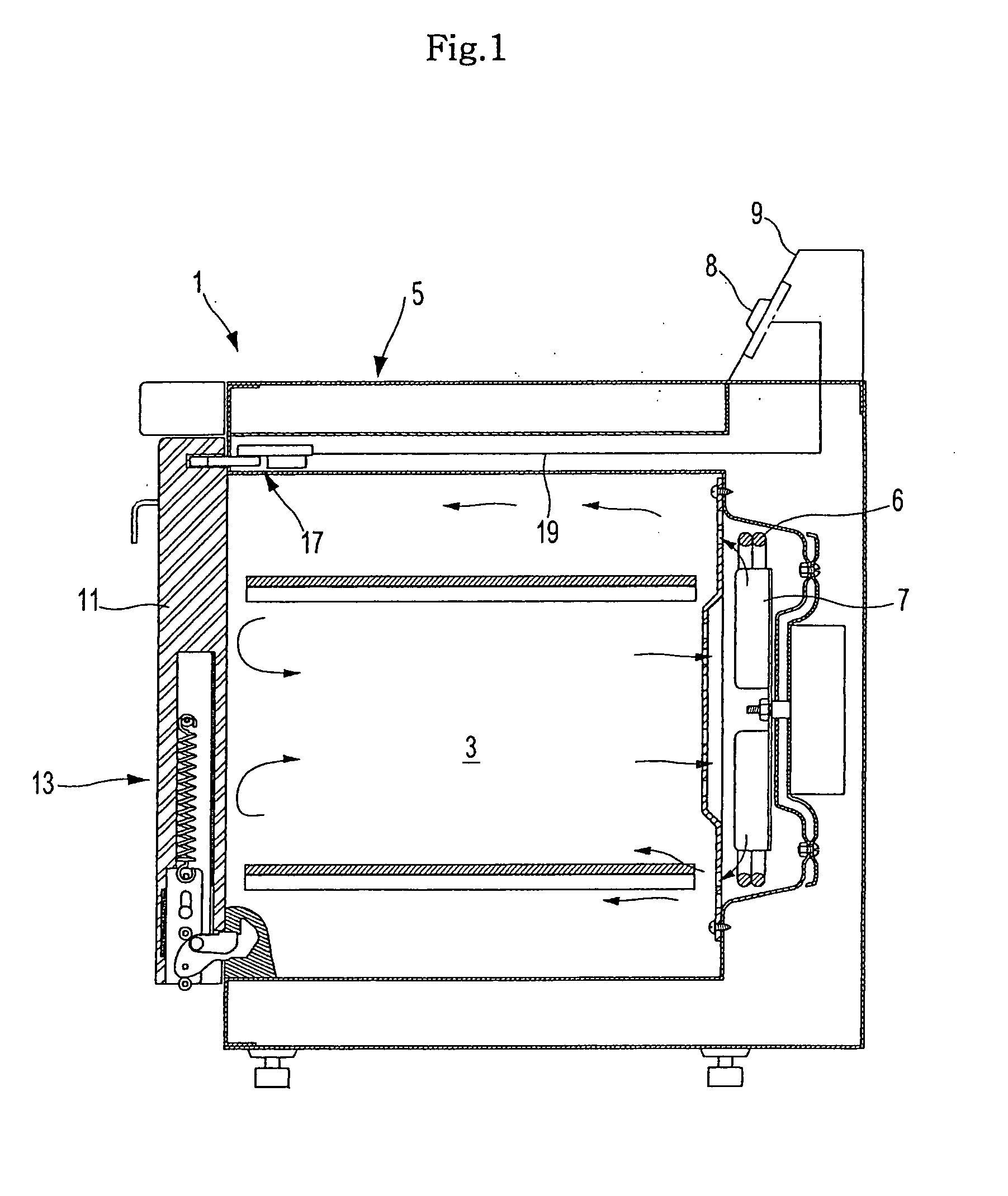 Heating cooker with hinged door