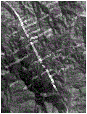 Detection method based on ridge energy correction for ribbon underground target in mountain land