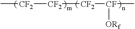 Method of cleaning fluorine-containing rubber molded article for semiconductor production apparatuses and cleaned molded article