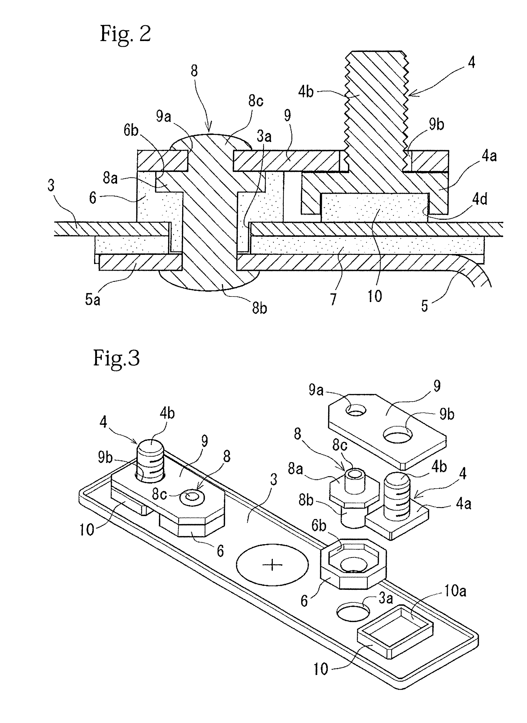 Battery including baffling member and sealing material that seals auxiliary terminal to lid plate