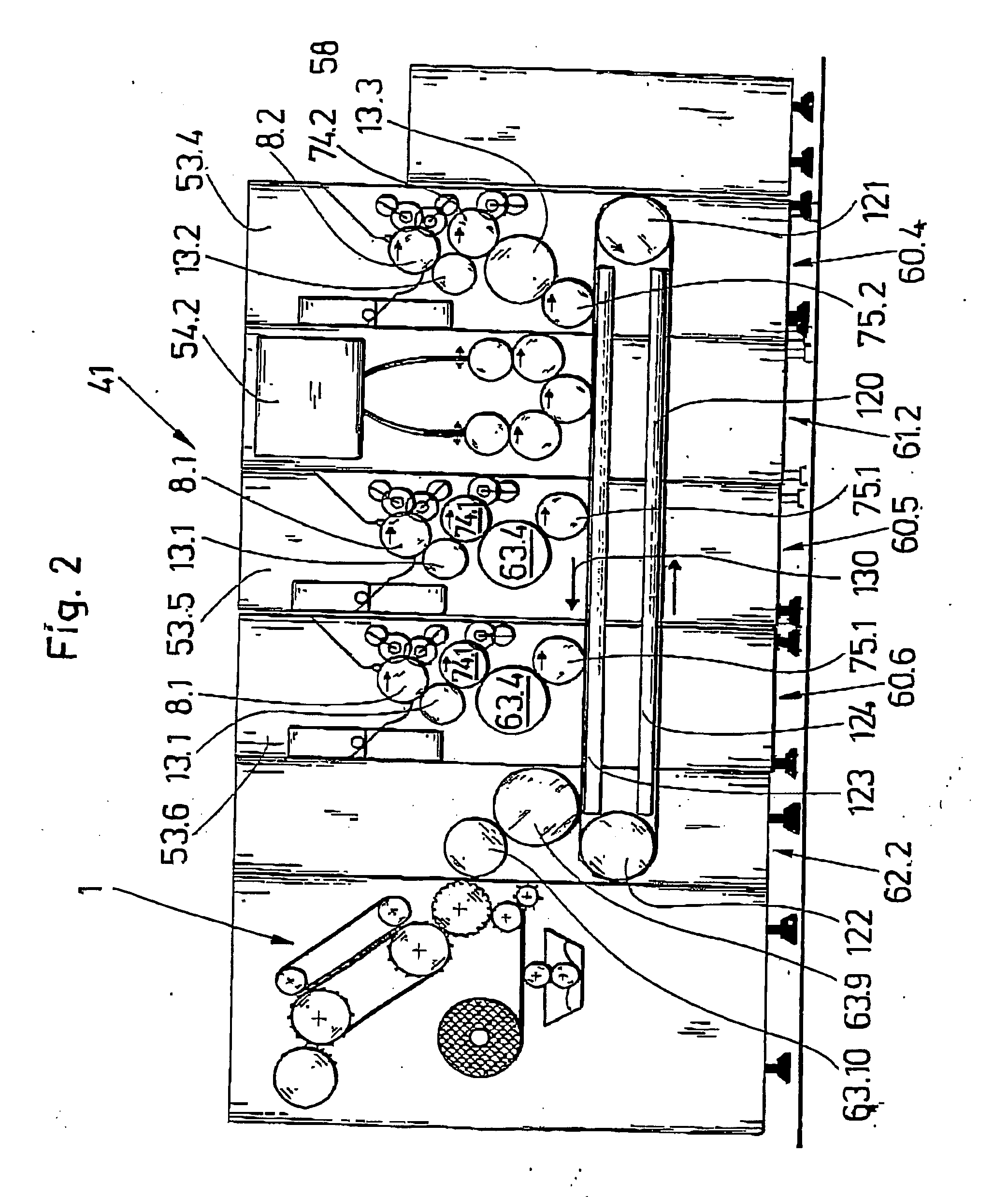 Device for wrapping groups of filter segments with a wrapping material for producing multi-segment filters of the tobacco industry and multi-segment filter production device