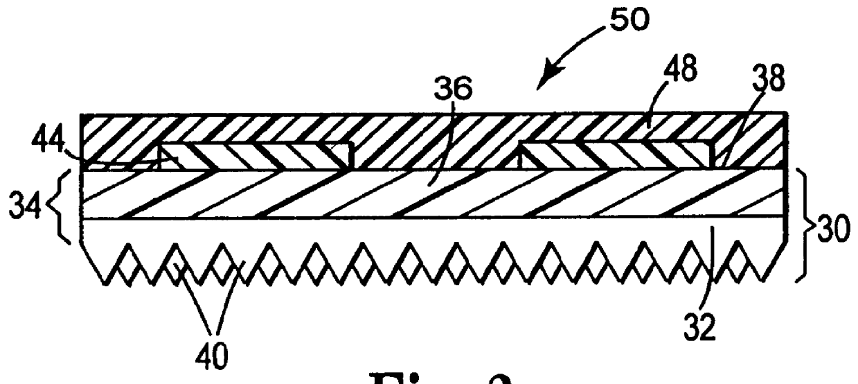 Retroreflective graphic article bearing fluorescent legends and method of making