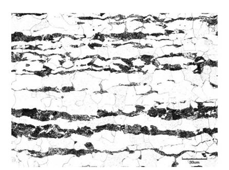 High speed production method for controlling banded structure of low carbon steel wire rod